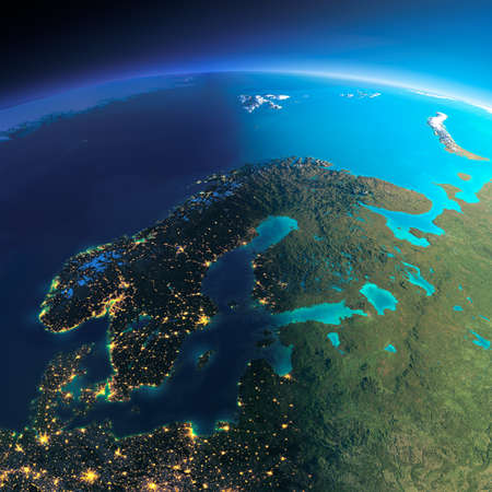Highly detailed planet Earth. Night with glowing city lights gives way to day. The boundary of the night & day. Europe. Scandinavia. Elements of this image furnished by NASAの写真素材