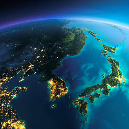 Highly detailed planet Earth. Night with glowing city lights gives way to day. The boundary of the night & day. Korea and Japan. Elements of this image furnished by NASAの写真素材
