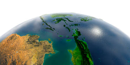 Highly detailed planet Earth with exaggerated relief and transparent oceans illuminated by sunlight. Southeast Asia. Indonesia.の写真素材