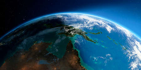Highly detailed Earth with atmosphere, exaggerated relief and light-flooded cities. Transition from night to day. Australia and Papua New Guinea. 3D rendering.の写真素材