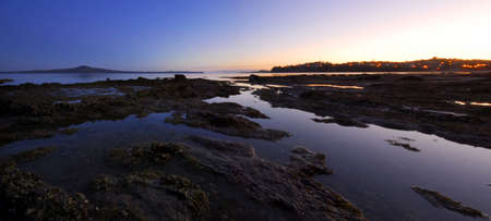 Sunrise on a beautiful coastline, Auckland, New Zealandの写真素材