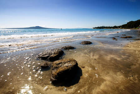 Early morning Takapuna beach on a beautiful summer's dayの写真素材