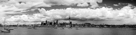 The beautiful Auckland skyline with white fluffy clouds...の写真素材