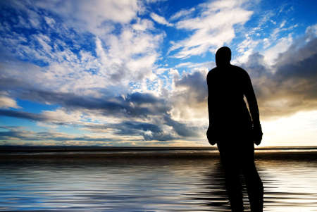 "Another Place" Anthony Gormley sculpture, Crosby, Liverpool at sunsetの写真素材