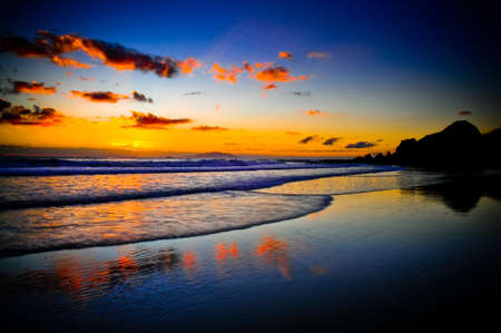 Magical morning coastal sunrise on a beautiful beach.の写真素材