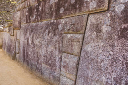 A close up of a inca stone wall from Machu Picchu templeの写真素材