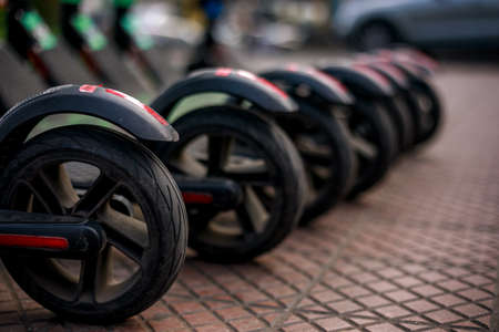 Close up of an electrical scooter back wheel.