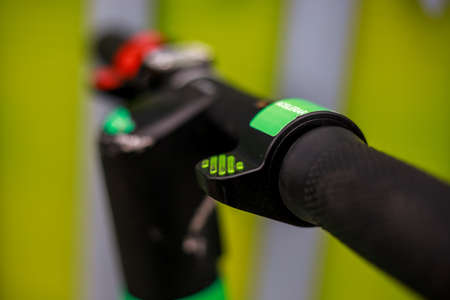 Close up of an electric scooter handlebar steering acceleration button.の写真素材