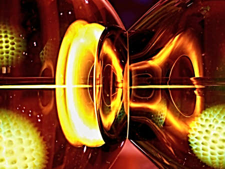 Part of glass lamp with surrounding light created abstract look.の写真素材