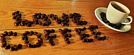 LOVE COFFEE made of coffee beans and espresso cupの写真素材