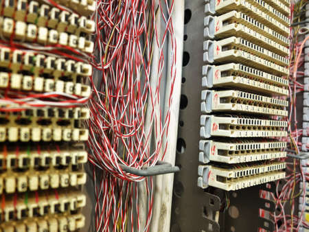 Phone junction box, switchboard with lots of cablesの写真素材