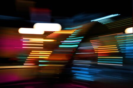 Colorful lights of urban surrounding blurred by motionの写真素材