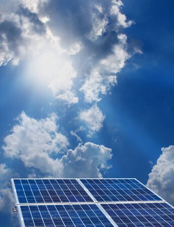 Group of four solar panels on sunny blue sky backgroundの写真素材