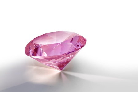 Pink gemstone diamond shining on light grey backgroundの写真素材
