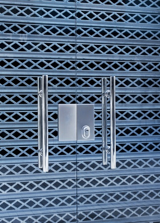 Security glass doors locked, aluminum shutter grill protectionの写真素材