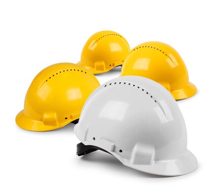 Four hard hat work team, protective safety helmets isolatedの写真素材