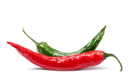 Red and green chili pepper isolated on whiteの写真素材