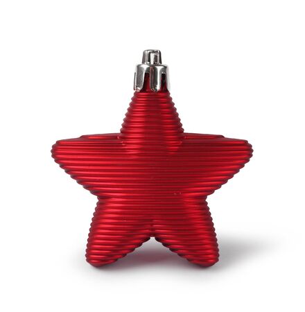 Red Christmas decoration star isolated on white backgroundの写真素材