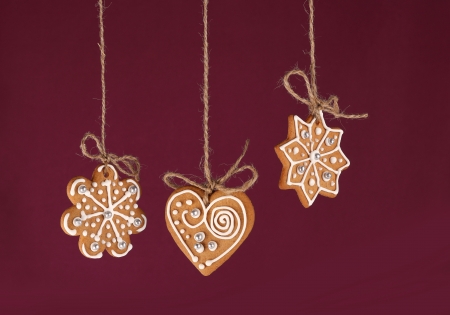 Christmas gingerbreads hanging in traditional linen stringの写真素材