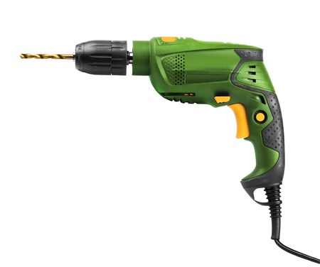Green yellow electric drill repair tool isolated on whiteの写真素材