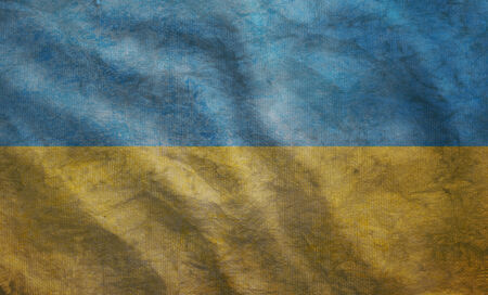 Weathered Ukraine flag grunge rugged condition wavingの写真素材