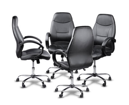 Four office chairs having a meeting, teamwork conceptの写真素材
