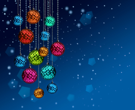 Group of colorful Christmas glass decoration balls on blue snowfall backgroundの写真素材