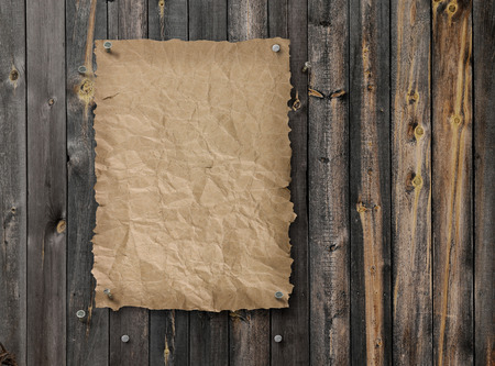 Empty Wild West wanted poster on weathered plank wood wallの写真素材