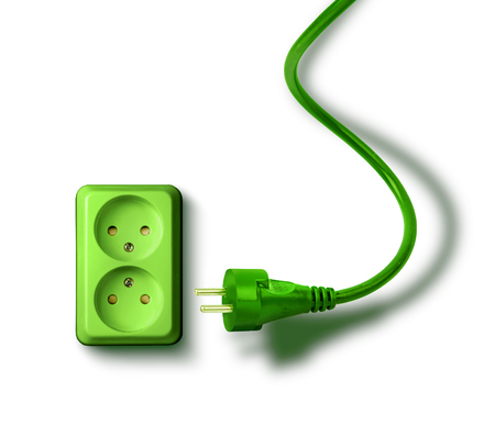 Green electrical socket and plugs renewable eco energy conceptの写真素材