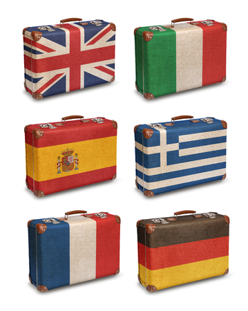 Vintage suitcase flags UK Italy Spain Greece France Germany isolatedの写真素材