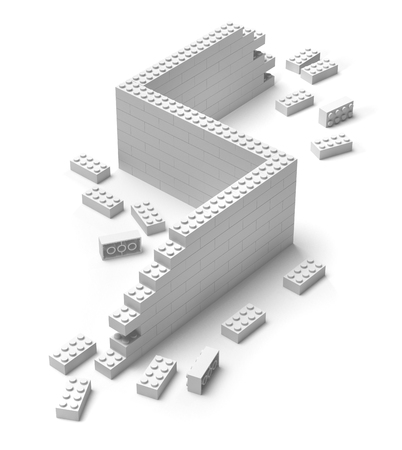 Building toy blocks wall under construction 3D, isolated on whiteの写真素材