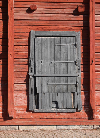 Old weathered wooden magazine warehouse doorの写真素材