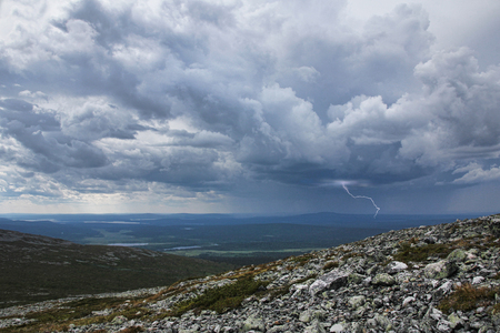 Thunderstorm with lightning and heavy rain approaching Fell Pallastunturi in Finnish Laplandの写真素材
