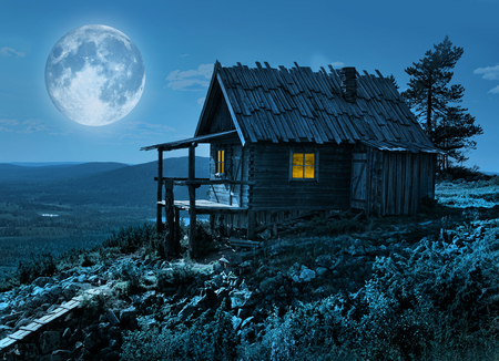 Santa Claus secret cottage on Lapland fell top in mysterious moonlightの写真素材