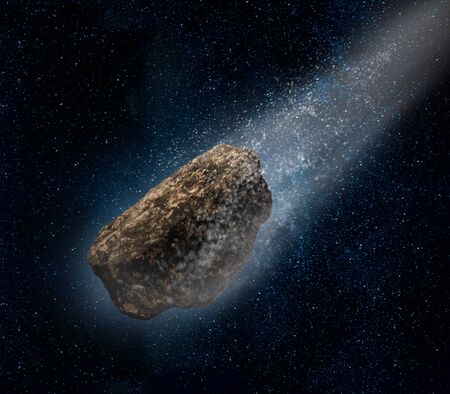 Asteroid speeding forward in deep space on starfield backgroundの写真素材