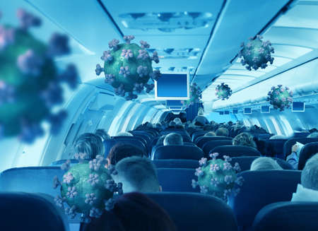 Airborne viruses with passengers travelling in airplane cabin interior economy classの写真素材