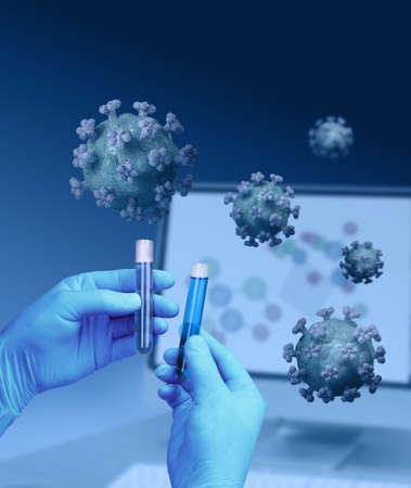 Hands holding test tubes for medical analysis and corona virus testの写真素材