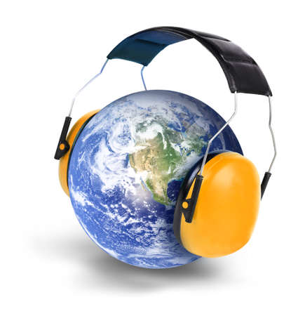 Noise pollution concept planet Earth with hearing protectors isolated white backgroundの写真素材
