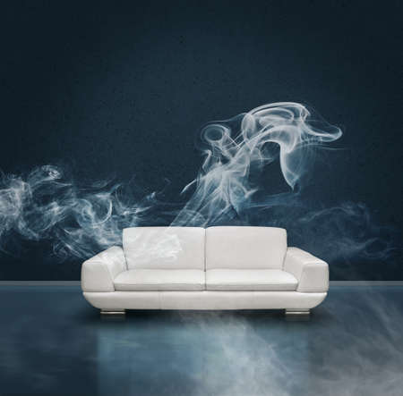 Dark blue room with white leather sofa, faint mysterious smoke trails, mystery concept backgroundの写真素材