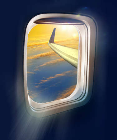 The new dawn of flight travel, a bright sunrise view from a jet plane window high on the blue skiesの写真素材