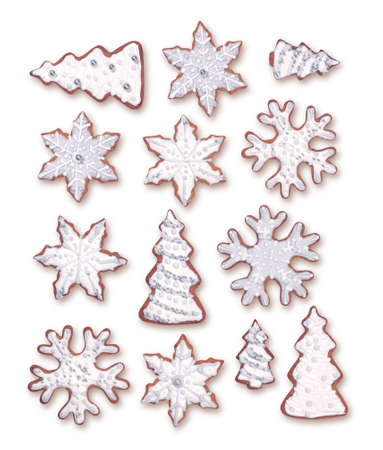 Sweet Christmas gingerbread cookies collection with white sugar icing decoration, isolated on white backgroundの写真素材