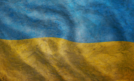 Weathered Ukraine flag grunge rugged condition wavingの写真素材