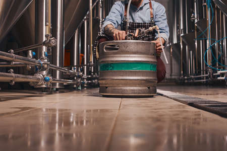 Close up of a beer vat being moved from place to place at the brewery.の写真素材