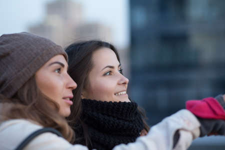 Stylish friend, tourists view the townの写真素材
