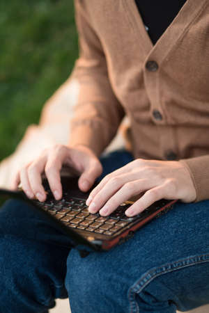 Man's hands to print text on the keyboardの写真素材