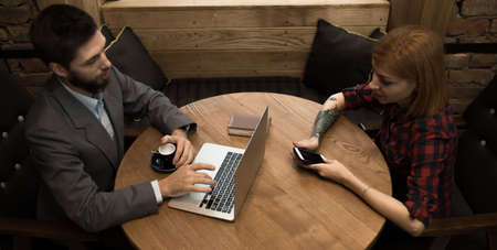 Business meeting and talks in cafesの写真素材