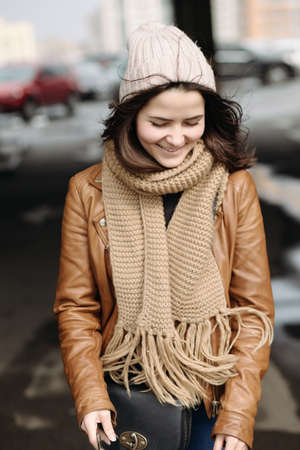 Smiling beautiful girl have a fun on roof of parkingの写真素材