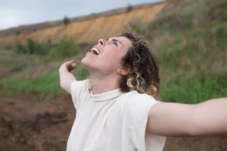 Freedom woman happy in a wildlife landscapeの写真素材