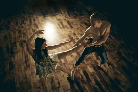 Couple dancing contemporary on floor, top viewの写真素材