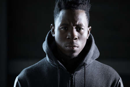 Gangster african man in dark